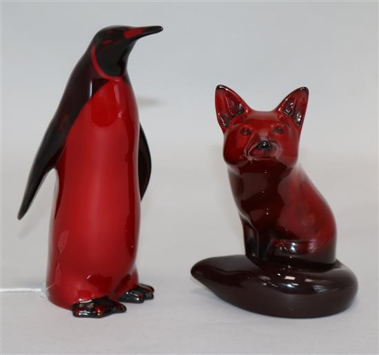 A Royal Doulton penguin and fox